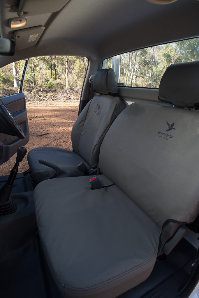 Standard Grey driver bucket and Passenger 3/4 bench Black Duck seat covers.