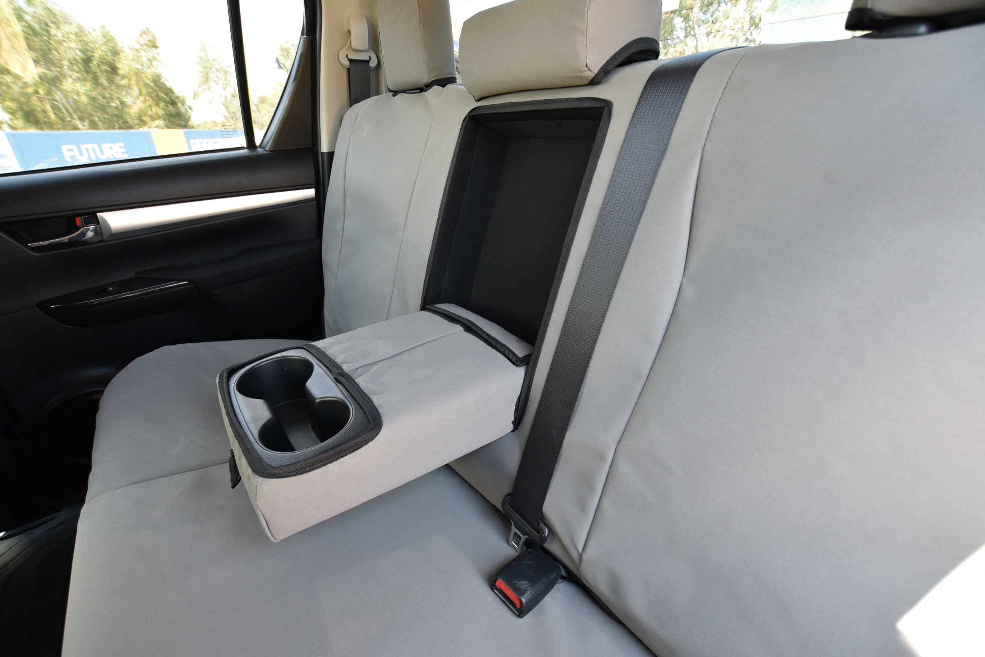 All functions of seat accessories are catered for including cup holders Grey canvas shown.