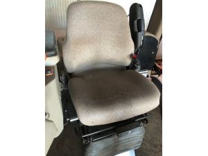 CONFIRM your seat by comparing it with the seats in the images, these seats are used in a wide variety of machines, they may be upholstered in either by cloth or vinyl.
Machines including: New Holland SP Windrower, Case IH Headers, Case IH Tractors, Cat Backhoe Loaders, Macdon SP Windrower