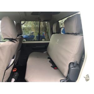 GREY CANVAS  BLACK DUCK SEAT COVERS FITTED TO A TOYOTA LANDCRUISER DUAL CAB REAR BENCH SEAT