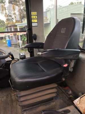Black Duck Seat Covers for KAT5AR fits KAB-515-525-555 image shows set fitted in a fitted to a Cat 914 G Loader