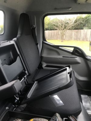 Black Duck Canvas Seat Covers offer maximum protection to the seats in your Fuso Canter 615, 715, 815 & 918  WIDE CAB - single cabs and dual cab trucks, shows fold down middle backrest.