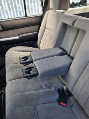 Black Duck® SeatCovers Row Two Rear Bench 50/50 split with Armrest Cover Nissan Patrol WAGONS from 10/2004 -04/2016.  NOTE THE POSITION OF THE CUP HOLDERS.