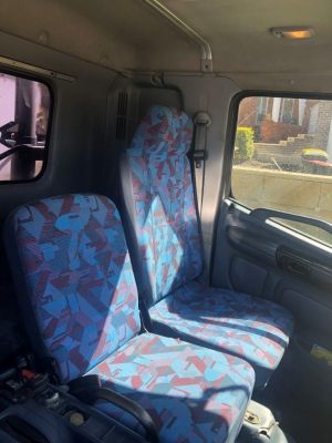 THE SMALL CENTER SEAT COVER IS PURCHASED AS AN OPTION
